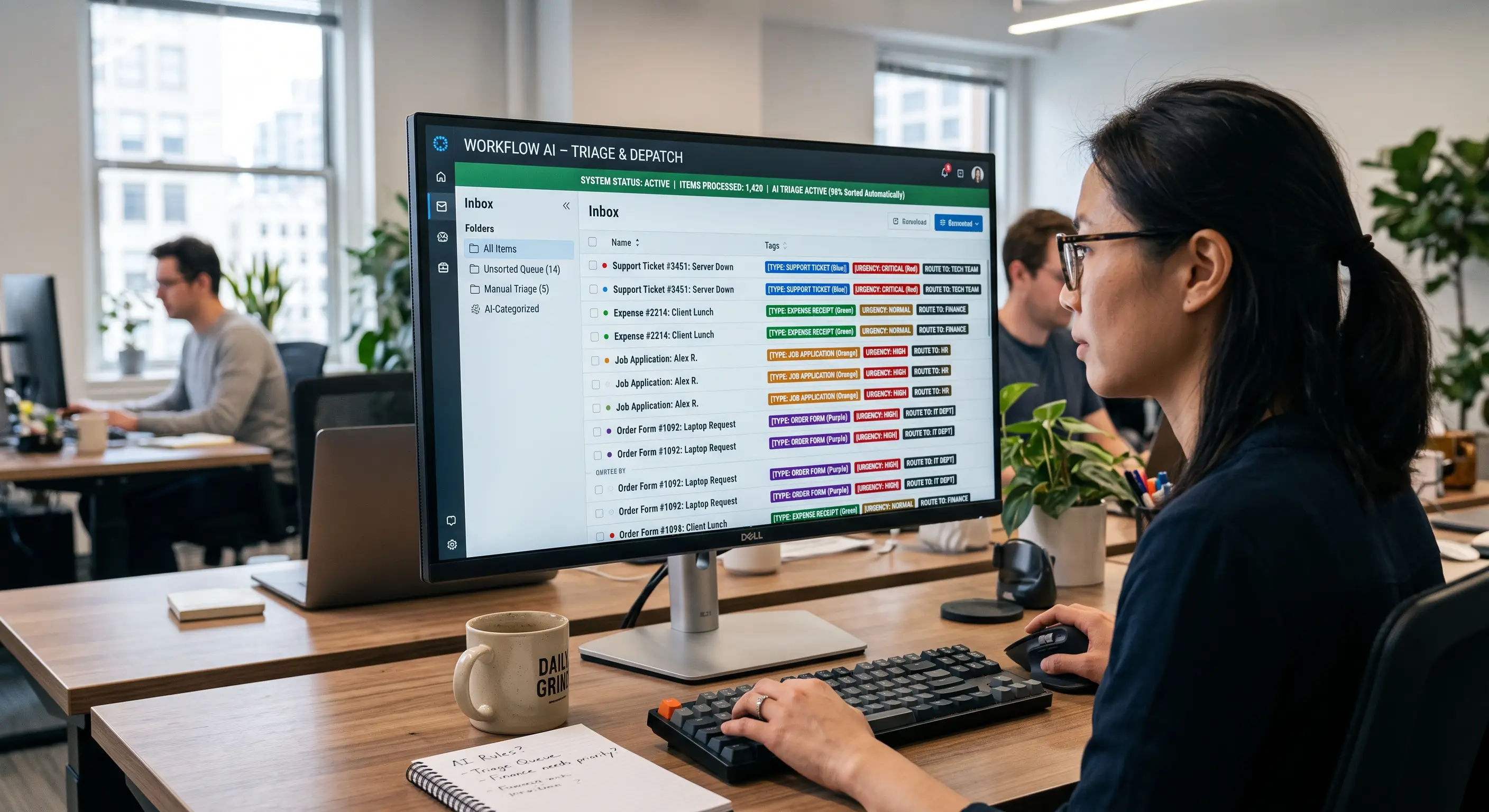 Photo of a lady working on her computer, sorting and summarizing data.